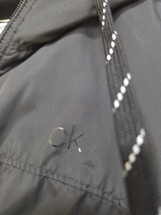 Womens Calvin Klein black hooded windbreaker jacket